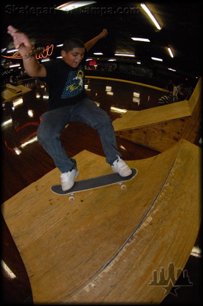 Some random kid new to skateboarding