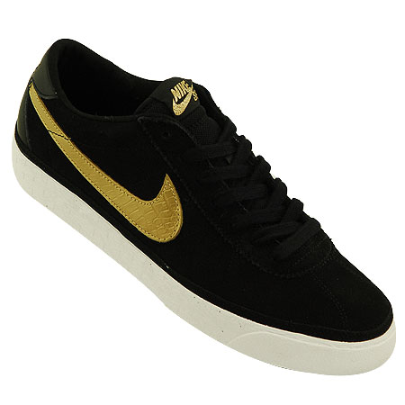 nike skate shoes black and gold